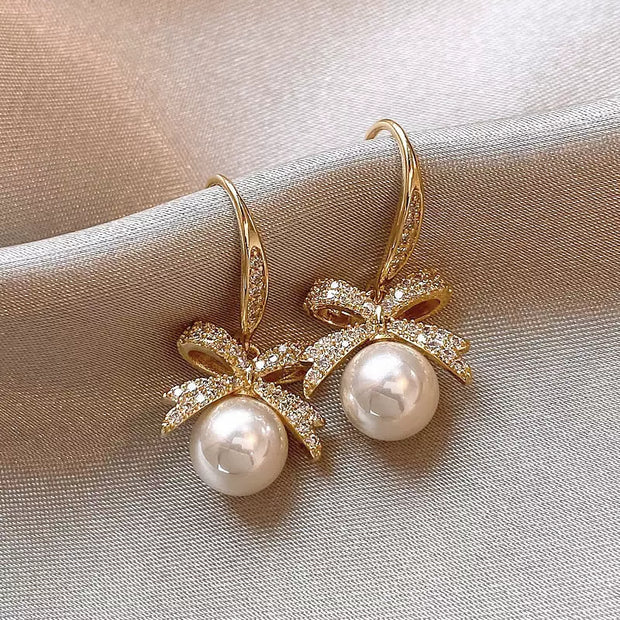 bow pearl earrings