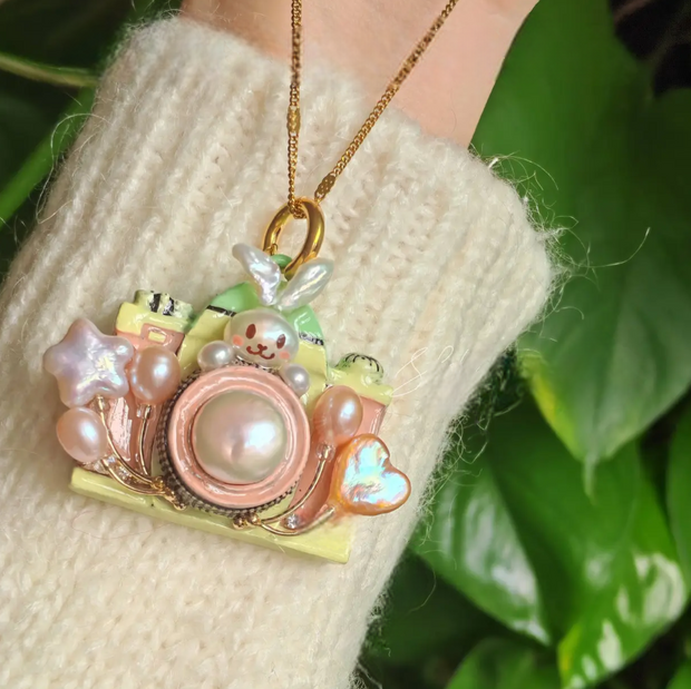 handmade baroque pearl camera pendant