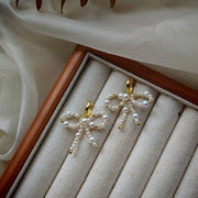 handmade bow baroque pearl earrings